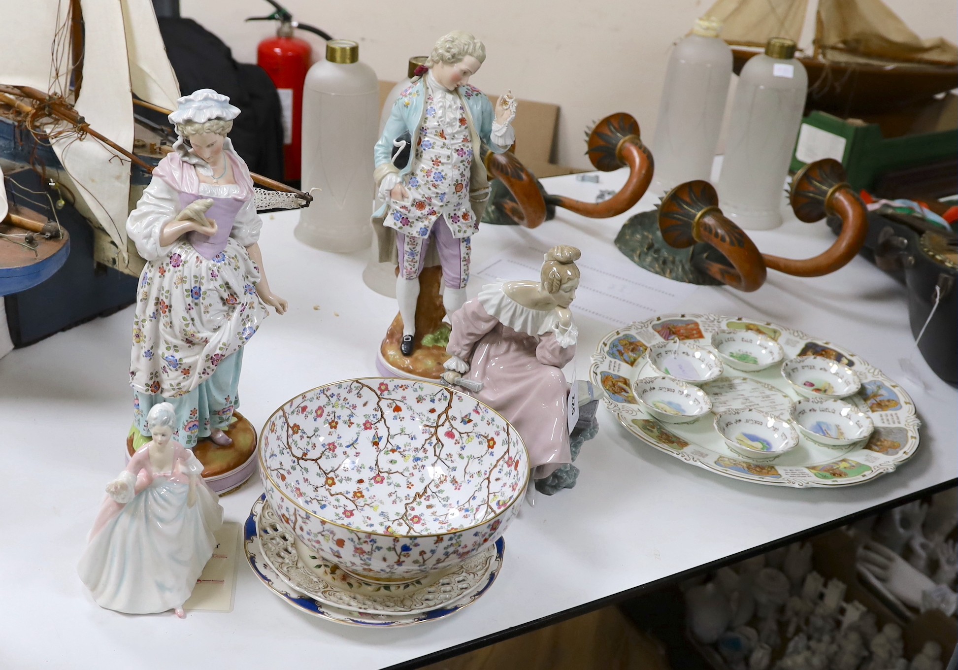 A pair of continental figurines, a Lladro figurine, Royal Doulton 'Diana' figurine, Spode bowl and two plates. Tallest 44cm